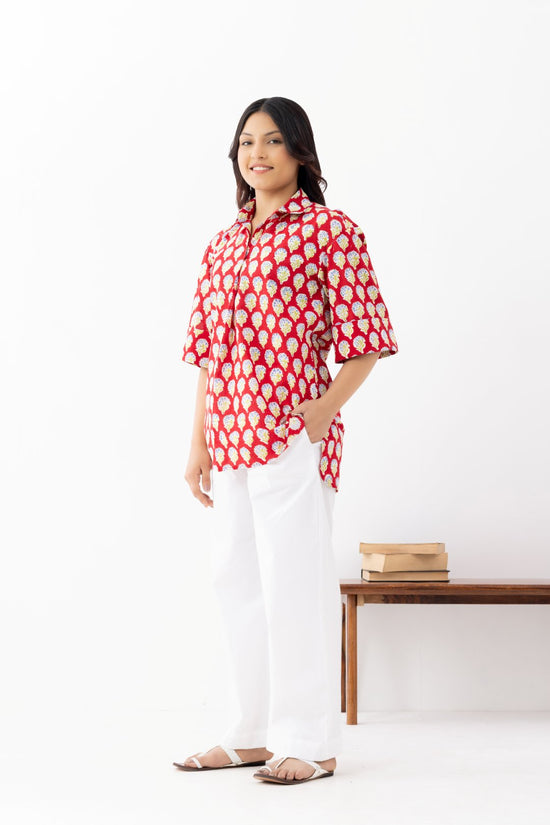 Woman wearing a pure linen cotton comfortable red and white block printed patterned shirt with regular collar and half sleeves