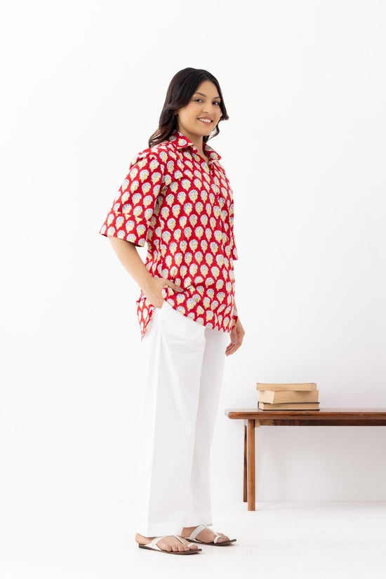 Woman wearing a pure linen cotton comfortable red and white block printed patterned shirt with regular collar and half sleeves