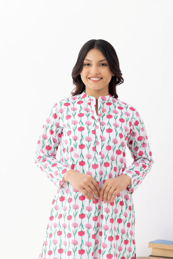Woman wearing a floral White Pink Printed Co-ords Set With a Mandarin Collar and Side Pockets