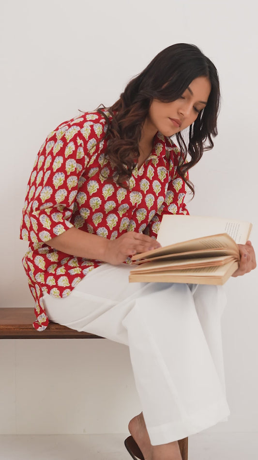 Woman wearing a pure linen cotton comfortable red and white block printed patterned shirt with regular collar and half sleeves